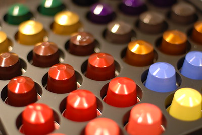 A collection of colour-coded coffee pods