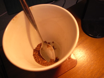 A cup and teaspoon