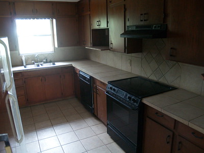 A small kitchen with different appliances