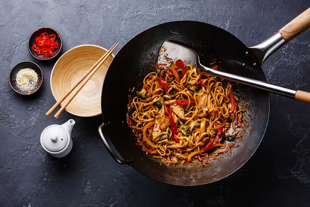 freshly cooked stir fried noodles with meat and vegetables