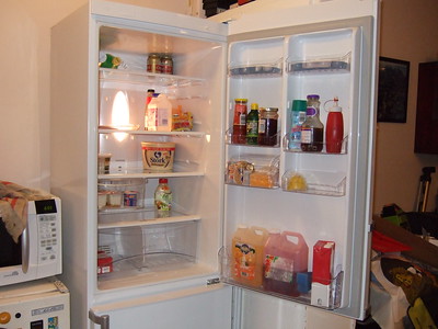 a-huge-refrigerator-packed-with-a-variety-of-food-and-drinks