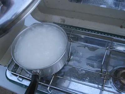 boiling pot over a stove