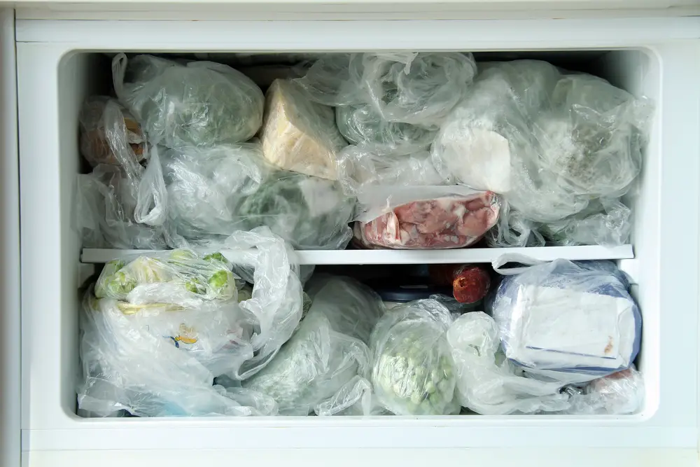 a fridge with full vegetables