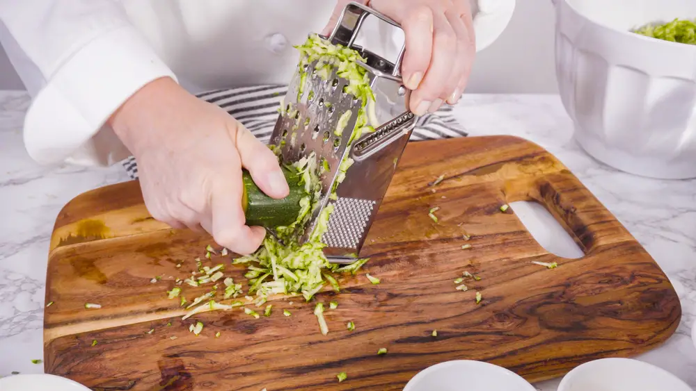 Shredding organic zucchini using a box grater